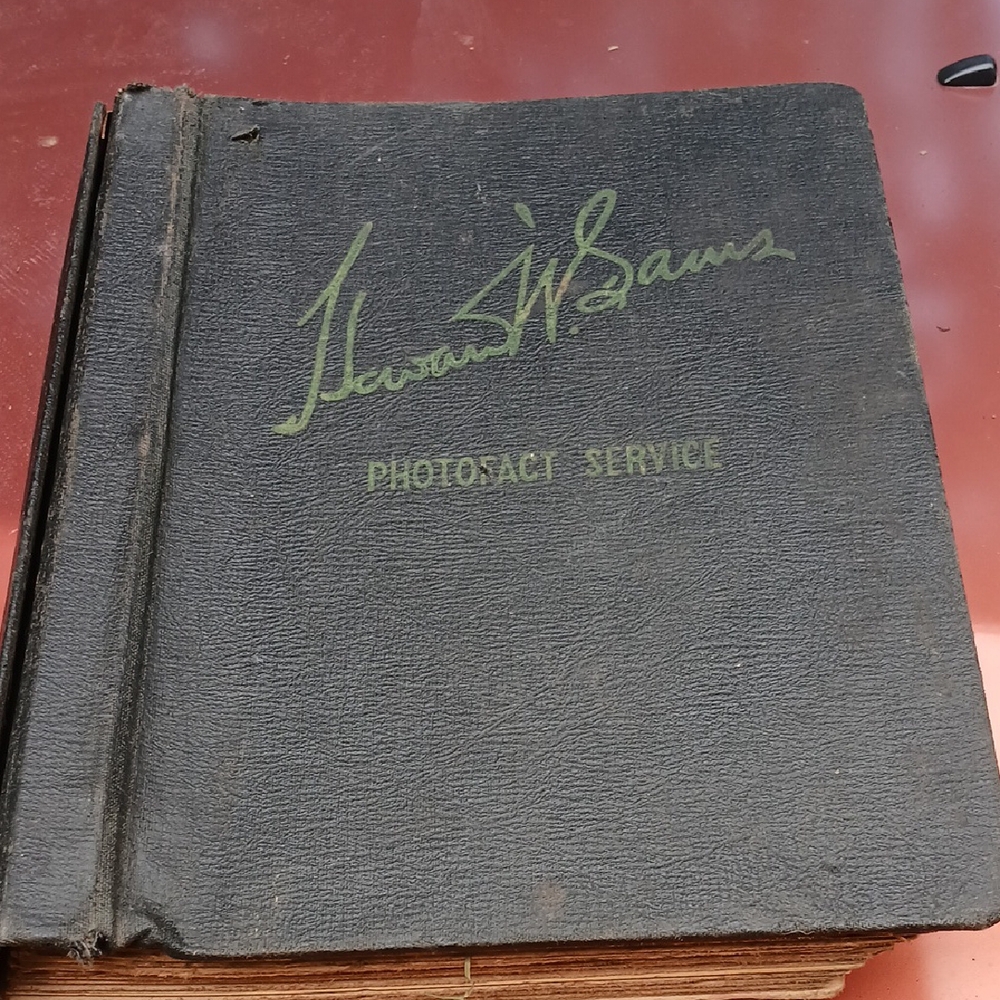 Black Photostat Service Book with Signature